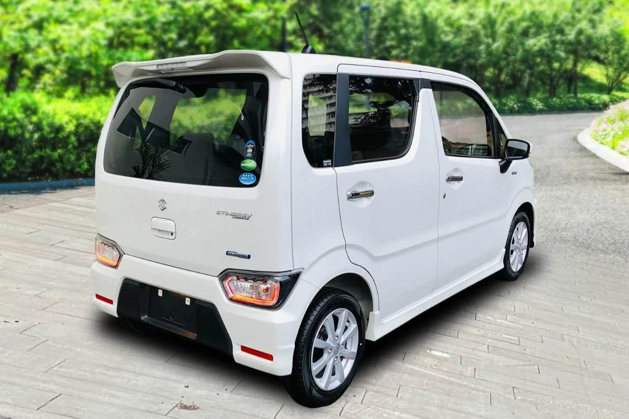 Rear three-quarter view of a Suzuki Wagon R with roof spoiler for rent in Sri Lanka